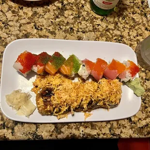 a plate of sushi on a table