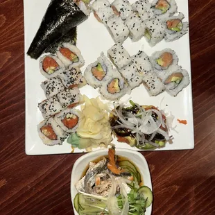 Salmon Hand roll, California rolls, and Spicy Tuna, Salmon Skin Sunomono