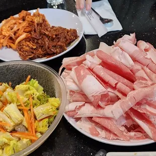 Beff brisket,  spicy Pork belly, spicy bulgogi, sides and salad