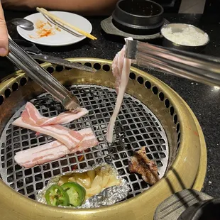 Very thin pork belly. Half the thickness of what it used to be. It was like grilling bacon.