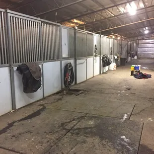 Aisleway as typical in a state of disarray. The water on the ground is due to their lack of automatic water.