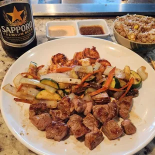 The full meal. Shima Steak and Shrimp combo, fried rice, and large Sapporo beer - tender but bland - meh