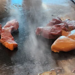 Cooking up Shima Steak (left), Filet Mignon (right), and Chicken