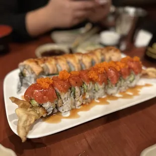 a plate of sushi on a table