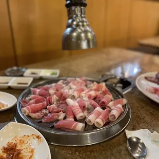 a plate of meat on a table