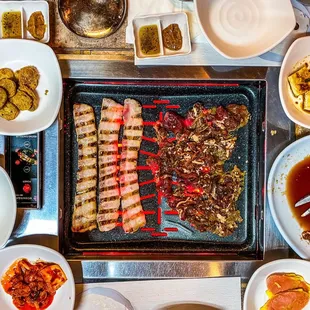 Pork Belly, Marinated Beef Bulgogi and banchan.