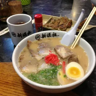 Hakata Ramen w/cha shu, egg, ginger.   Gyoza and tea