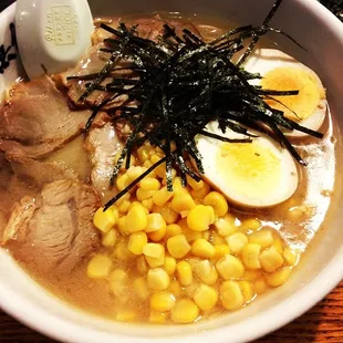 Hard noodles, medium oil, strong base with pork, egg, corn, &amp; dried seaweed.