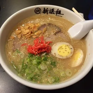 Extra egg and garlic chips on top.