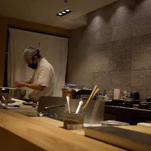 a chef preparing food in a restaurant