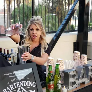 Kelsey working the bar