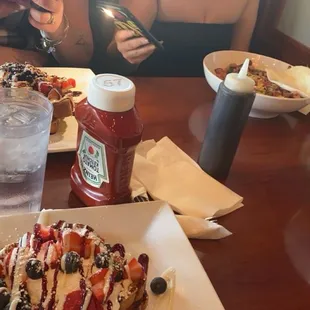 Loaded berry French toast! I love it so far the best French toast I've ever had needs no syrup!