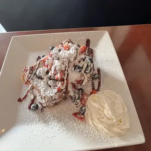 Mixed Berry French Toast. Chef's kiss! The bread was perfectly toasted, the vanilla cream on top was heavenly. Just overall amazing.