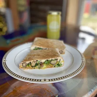 a plate with a sandwich on it