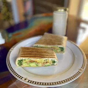 a plate with a sandwich on it
