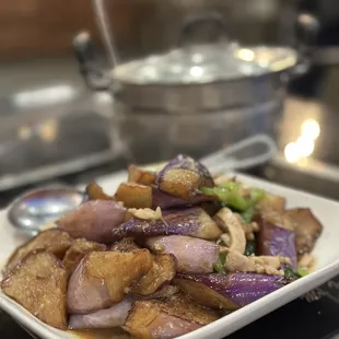 a plate of stir fried vegetables