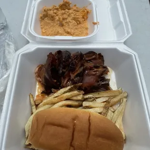 From the Top: side of Buffalo Chicken Dip, Pulled pork, side of fries, potato hotdog roll