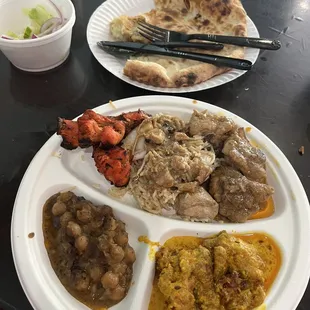 Chicken Curry, Tandoori Chicken, Naan, Salad, Veggies.