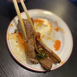 My husbands creation with chashu, spicy garlic oil and bamboo shoots