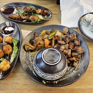 Array of choices.  Wings 5/5 Shumai 5/5 Chicken skewers 4.5/5 Steak hibachi 4/5 (overcooked) Spicy crab roll 4/5 Fresh salmon Nigiri 5/5