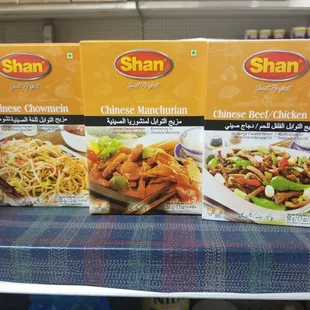 three packages of asian food