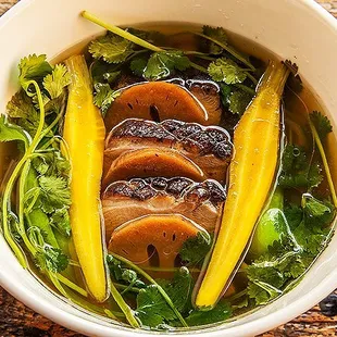 Smoked Duck Ramen with roasted duck and vegetable broth and house-smoked duck