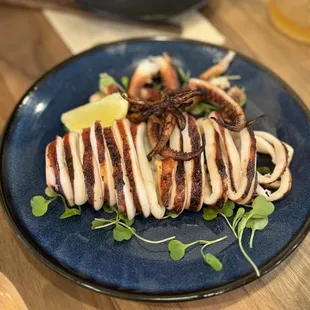 Whole grilled squid.