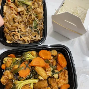 Sesame Chicken (bottom); Drunken Noodles (top)