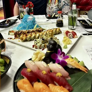 Lots of sushi, fire and ice,shrimp tempura roll, filet roll, spicy salmon and many more