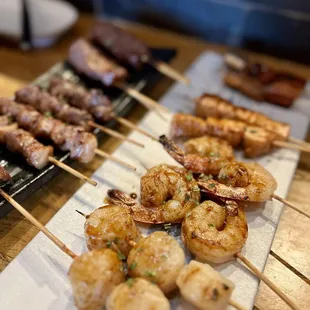 Seafood combo: scallop, shrimp, seared salmon, and unagi (eel)