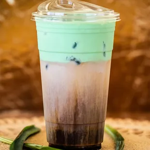 Pandan Iced Coffee -- creamy coffee topped with pandan coconut cold foam and sweetened with authentic gula melaka