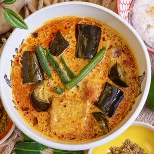 Nonya Eggplant Curry -- a creamy vegetarian curry made with eggplant, tomatoes, long beans, and fried tofu