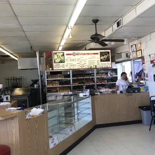 a woman behind the counter