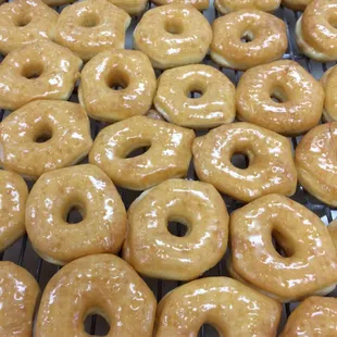 glazed donuts on a cooling rack