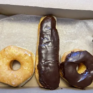 Glazed donut, filled bar and chocolate glazed donut