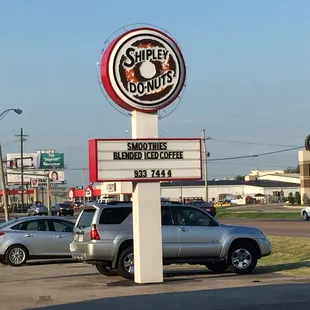 a sign for a donut shop