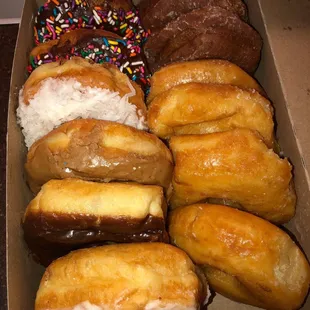a variety of donuts in a box