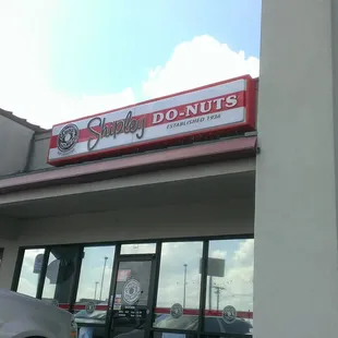 the outside of a donut shop