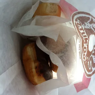 a donut in a paper bag