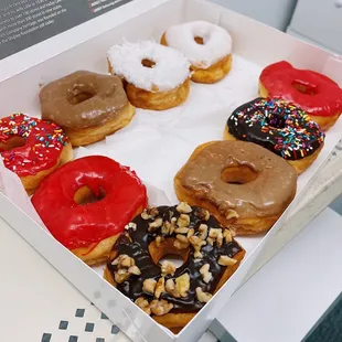 a variety of donuts in a box