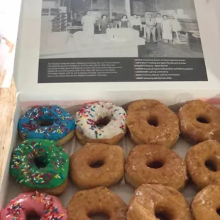 a dozen donuts in a box