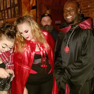 a group of people dressed in costumes