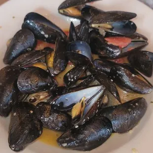 Steamed mussels in a garlic butter sauce.