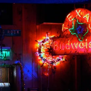 a neon sign for a mexican restaurant