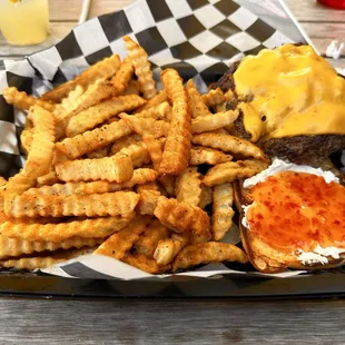 Smash burger with red pepper jelly and cream cheese with fries