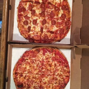 Two Take out mediums. One cheese, one light pepperoni.