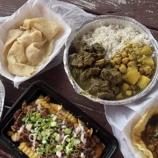 Curry Goat and Oxtail Fries