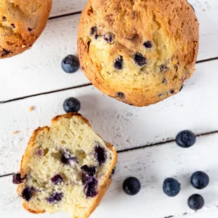 blueberry muffins on a white table