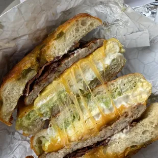 Jalapeño cheddar bacon sausage egg cheese avocado mayo bagel.