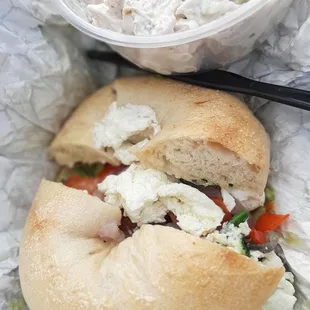 Egg white veggie in a sourdough bagel..... with side of chicken salad.